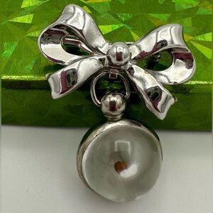 VTG Coro Signed Silver Tone Bow Brooch Pin Mustard Seed Encased in Clear Orb